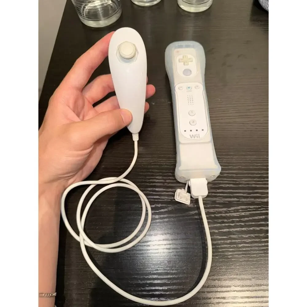 Nintendo Wii Remote with Nunchuk and Wii MotionPlus Adapter